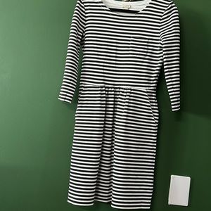 J Crew black and white striped knee length dress with pockets.